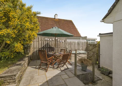 The paved terrace, brbecue & alfresco dining area at Anchor Watch, Fowey