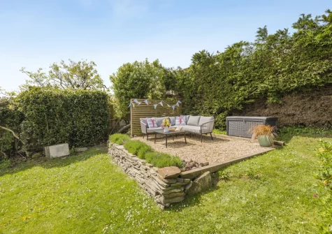 The outdoor sitting area & rear garden at Anchor Watch, Fowey