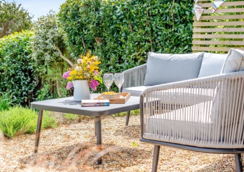 The outdoor sitting area & rear garden at Anchor Watch, Fowey