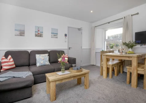 The living & dining area at Anchors Away at Sunnybeach Apartments, Paignton