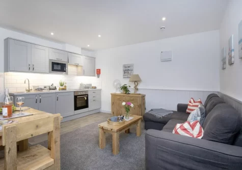 The living, dining area & kitchen at Anchors Away at Sunnybeach Apartments, Paignton