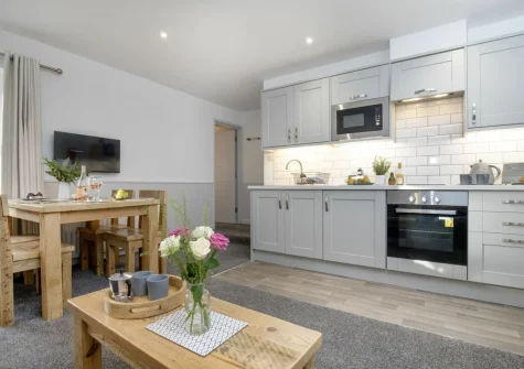 The dining area & kitchen at Anchors Away at Sunnybeach Apartments, Paignton