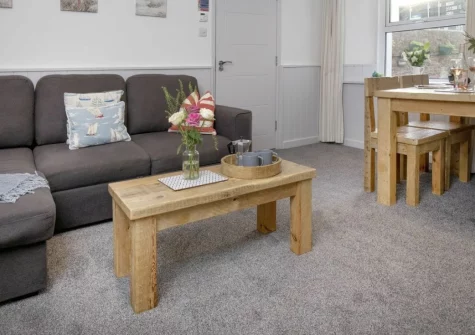 Anchors Away at Sunnybeach Apartments, Paignton, is a bright, coast-inspired apartment just moments from the sand. Enjoy open-plan living, a cosy twin bedroom, and easy access to beaches, attractions and Torbay's favourite seaside charms.
