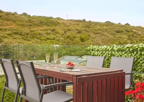 The balcony & alfresco dining area at Anneth Lowen, Polzeath
