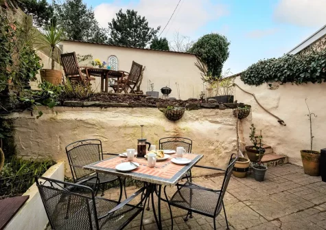 The patio, barbecue & alfresco dining area at Anvil Cottage, Barnstaple