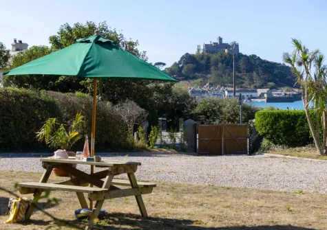 The shared garden & alfresco dining area at Apartment 1 at The Gew, Marazion