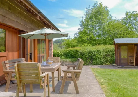 The patio, alfresco dining area & garden at Apple Barrel Barn, Dunkeswell Abbey