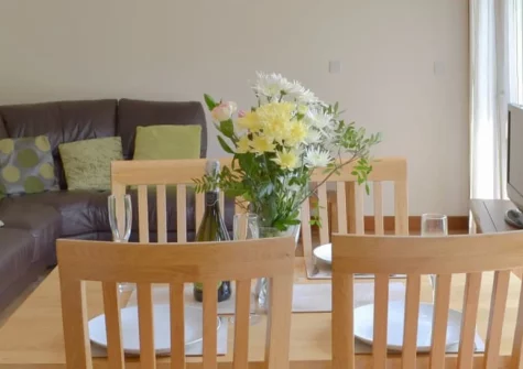 Apple Barrel Barn, Dunkeswell Abbey is a charming two-bedroom cottage set in peaceful Devon countryside, featuring an enclosed garden with barbecue, cosy open-plan living spaces, and easy access to historic sites and outdoor adventures.