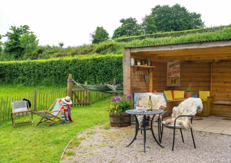 The patio, garden & outdoor sitting area at Apple Blossom at Devon Heaven Hideaways, Kenn
