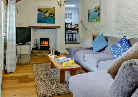 Apple Cottage & Piggery, Egloskerry is a characterful countryside retreat sleeping six across a traditional cottage and private annexe, featuring enclosed gardens, a cosy wood burner, and peaceful rural setting near Bodmin Moor and the North Coast.