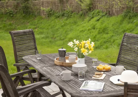 The alfresco dining area & garden at Apple Lodge, Little Dunley Cottages, Bovey Tracey