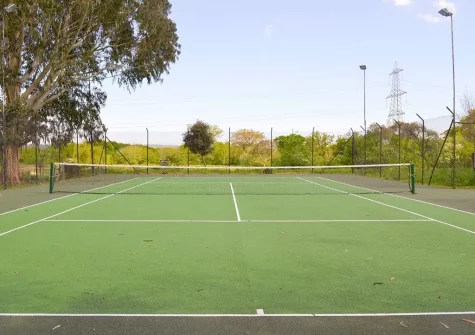 The shared tennis court at Little Dunley Cottages, Bovey Tracey