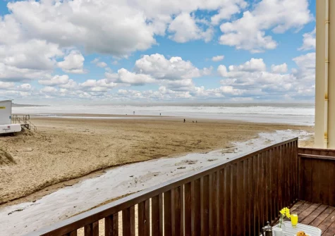 The beach & sea view from the balcony & outdoor sitting area at Arlington, Croyde
