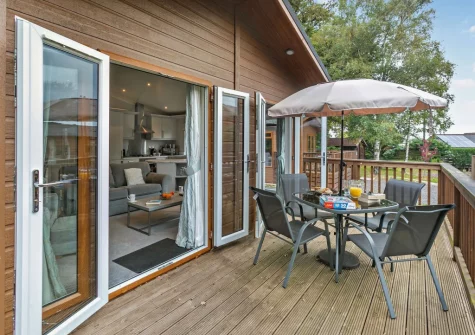 The decked terrace & alfresco dining area at Ash Lodge, Meldon