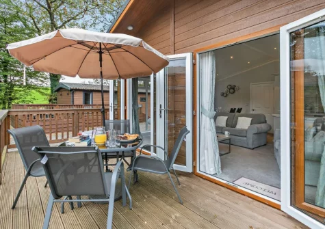 The decked terrace & alfresco dining area at Ash Lodge, Meldon