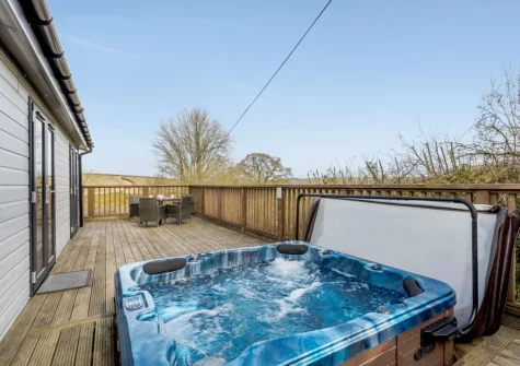 The decked terrace & sunken hot tub at Ash Lodge, The Retreat, Romansleigh