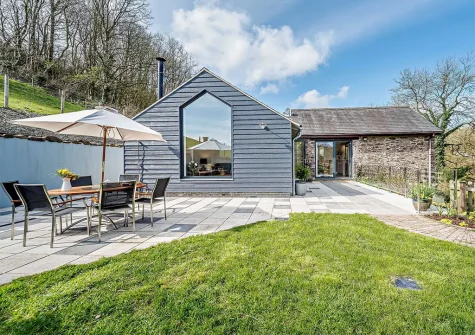 The patio, alfresco dining area & garden at Ashtree Cottage, Muddiford