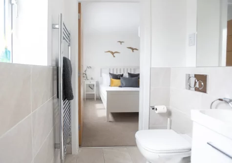 Bedroom #1 & en-suite shower room at Aspen Beach House, Westward Ho!