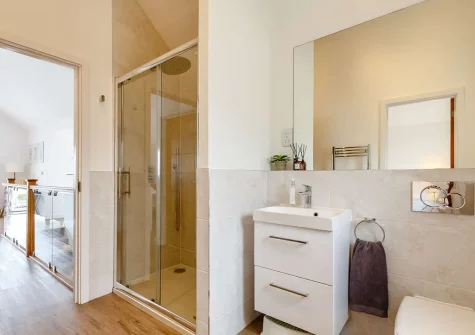 Bedroom #4 Jack 'n Jill en-suite shower room at Aspen Beach House, Westward Ho!