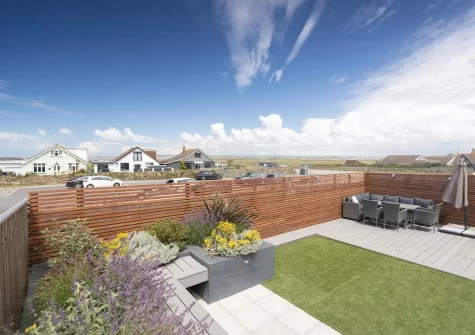 The garden, patio, barbecue & alfresco dining area at Aspen Beach House, Westward Ho!