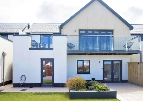 The balcony, outdoor sitting area & garden at Aspen Beach House, Westward Ho!