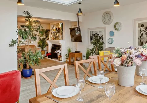 Atlantic Vibes, Westward Ho! is a stylish four-bedroom seaside home with panoramic sea views, spacious gardens, and a dedicated surf shower. Perfect for families seeking beach access, outdoor entertainment, and unforgettable coastal memories.