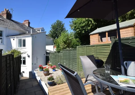 The decked alfresco dining & barbecue area at Aunties Cottage, Appledore