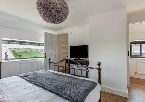 Bedroom #1 at Austen Cottage, Swanmoor Grange, Harracott