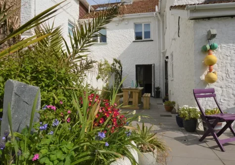 The patio & alfresco dining area at Bag End, Bude