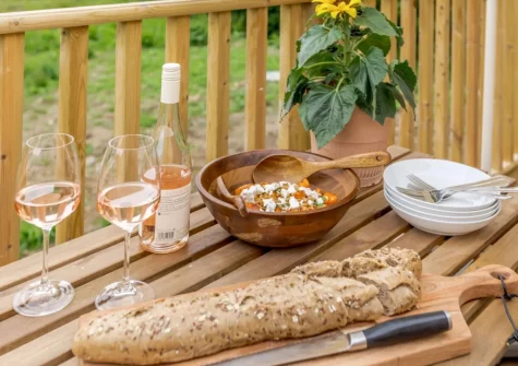 The enclosed decked wrap-around balcony & outdoor sitting area at Bailey Lodge, Barnstaple