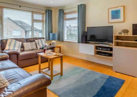 Bamboo, Croyde is a light-filled detached bungalow just a short way from Croyde's famous surf beach, featuring an enclosed garden with sunny patio, flexible sleeping for four, and the perfect base for exploring North Devon's Golden Coast.