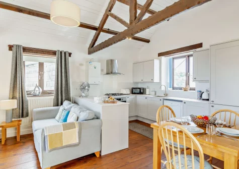 The living, dining area & kitchen at Banjo Cottage, Looe