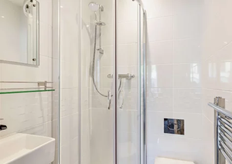 Bedroom #1 en-suite shower room at Banjo Cottage, Looe