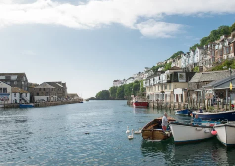 Looe is famous for its bustling fishing harbour, fresh seafood & charming, narrow streets