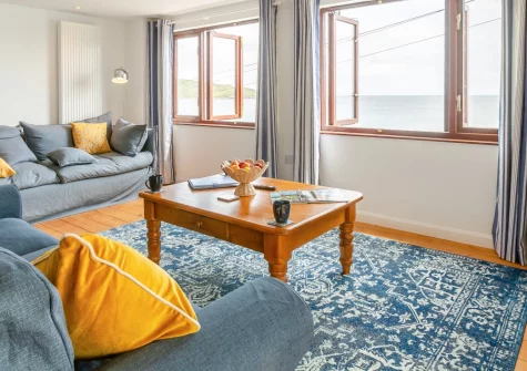 Barachy, Coverack is a beautifully appointed three-bedroom apartment just 20 metres from the beach, featuring two sun-drenched balconies with fantastic sea views, light-filled interiors, and the perfect base for coastal walks and family adventures.