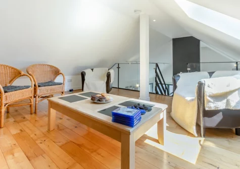 The galleried living area at Barn at Little Greenslade, Sampford Courteney