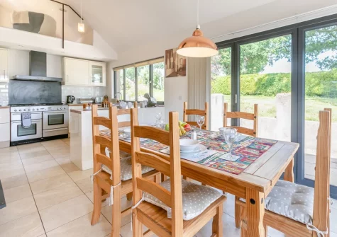The kitchen & dining area at Barn at Little Greenslade, Sampford Courteney