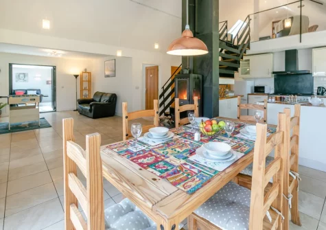 The dining area at Barn at Little Greenslade, Sampford Courteney