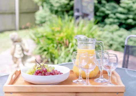 The patio, barbecue & alfresco dining area at Barn at Little Greenslade, Sampford Courteney
