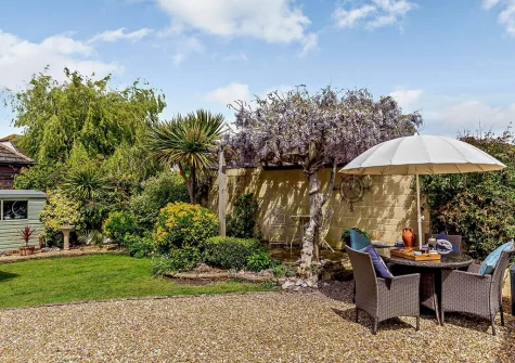The garden & alfresco dining area at Barn Cottage, Brixham