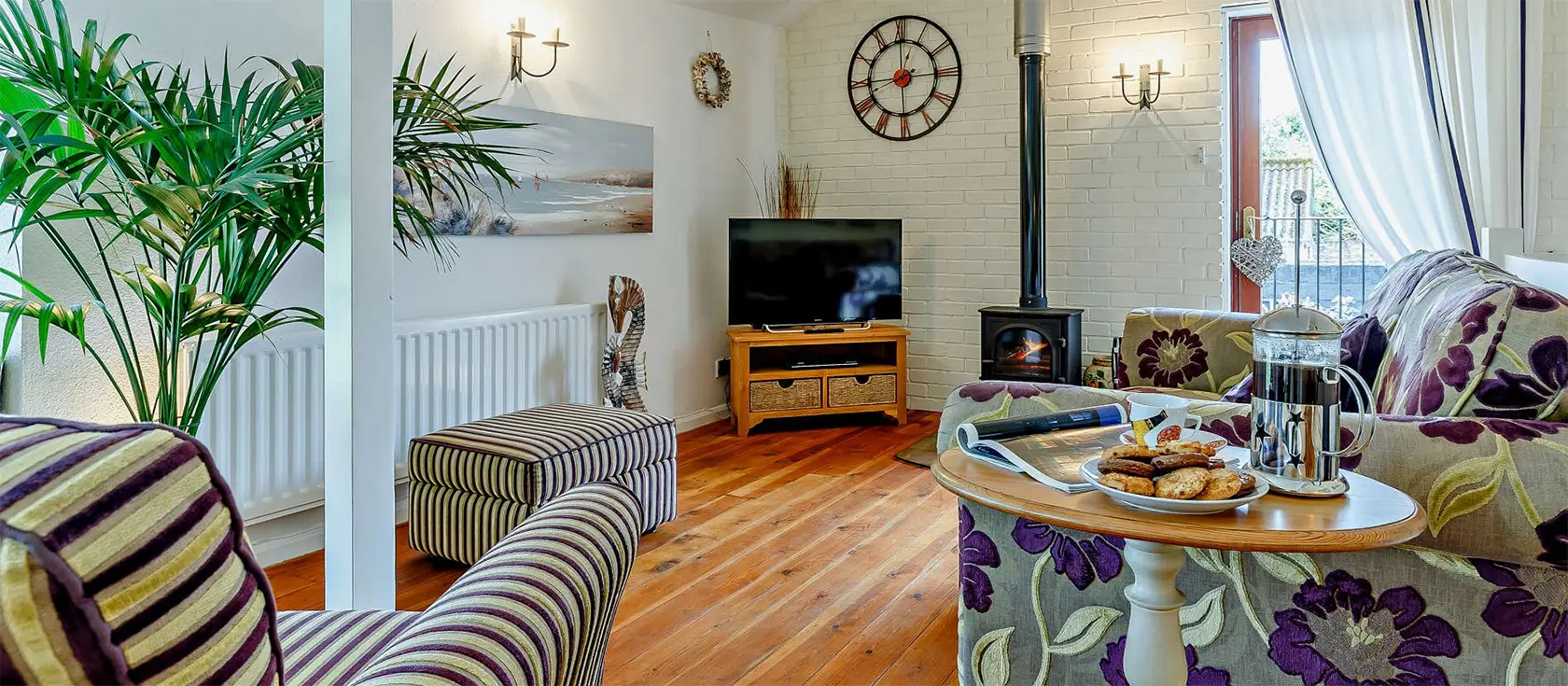 Barn Cottage, Brixham is a characterful two-bedroom retreat with exposed brickwork, a wood burner, & enclosed garden. Enjoy contemporary comforts, peaceful surroundings & easy access to Devon's coastal attractions, perfect for families & couples.