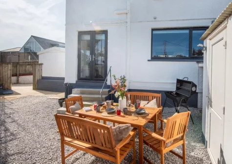 The courtyard, alfresco dining & barbecue area at Bassett Cove, St Ives