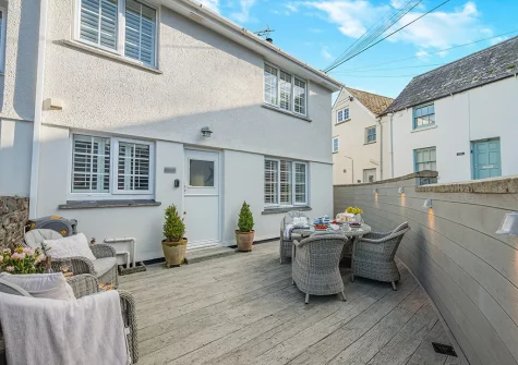The decked patio & alfresco dining area at Baxters Cottage, Padstow
