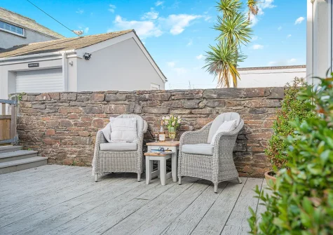 The decked patio & outdoor sitting area at Baxters Cottage, Padstow