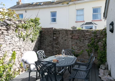 The decked courtvard & alfresco dining area at Bay Cottage, Brixham