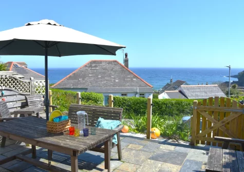 The front patio, alfresco dining & outdoor sitting area at Bay Cottage, Gorran Haven