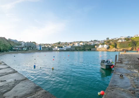 Gorran Haven is a popular destination for families due to its calm, crystal-clear waters & accessible amenities