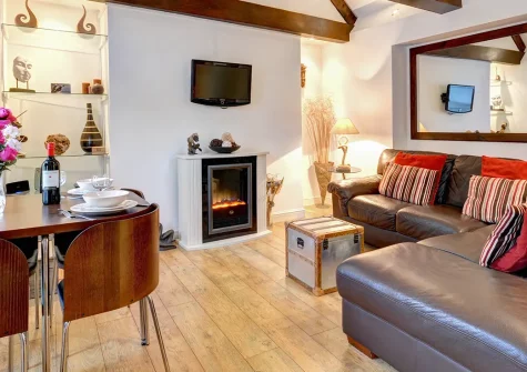 Bay House, Looe is an elegant harbour apartment with stunning rooftop views across the picturesque harbour. Perfect for couples, this distinctive retreat blends historic character with modern comfort for an unforgettable Cornish seaside escape.