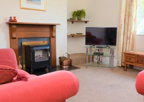 Bay Tree Farmhouse, Coombe is a characterful stone cottage set on over 100 acres of peaceful farmland, featuring four bedrooms, enclosed gardens perfect for children and dogs, and wonderful walks through private orchards and woodland.