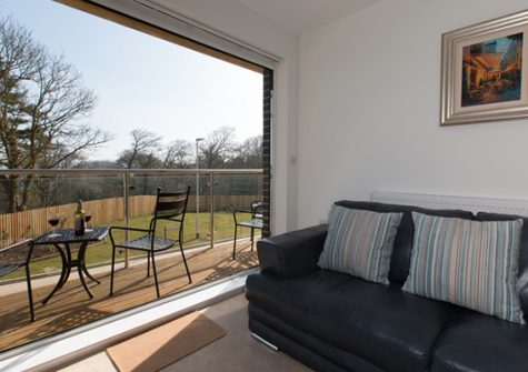 The open plan living & dining area and kitchen @ Bay View Apartment, St Austell